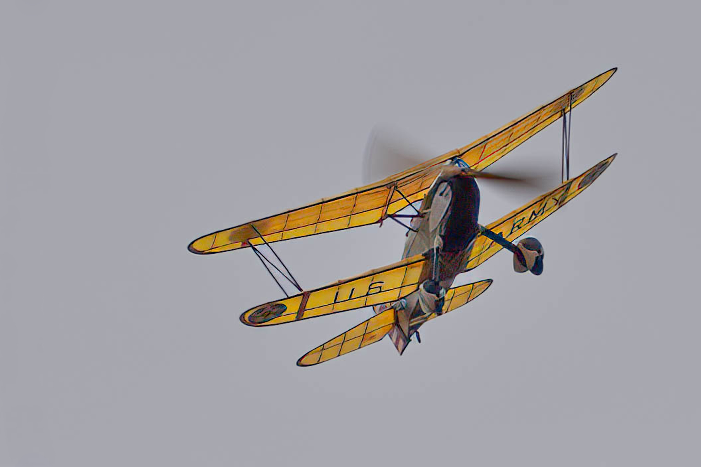 Tony Johnson model started as a Jmmie Allen Parasol kit, but as he can never leave anything alone it sprouted a bottom wing and became a semi-scale Curtis P6E Hawk with the Bald Eagle colour scheme. Flying Aces 2025 a Tony Martin photo.